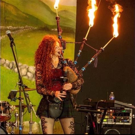 dame of drones female bagpiper.